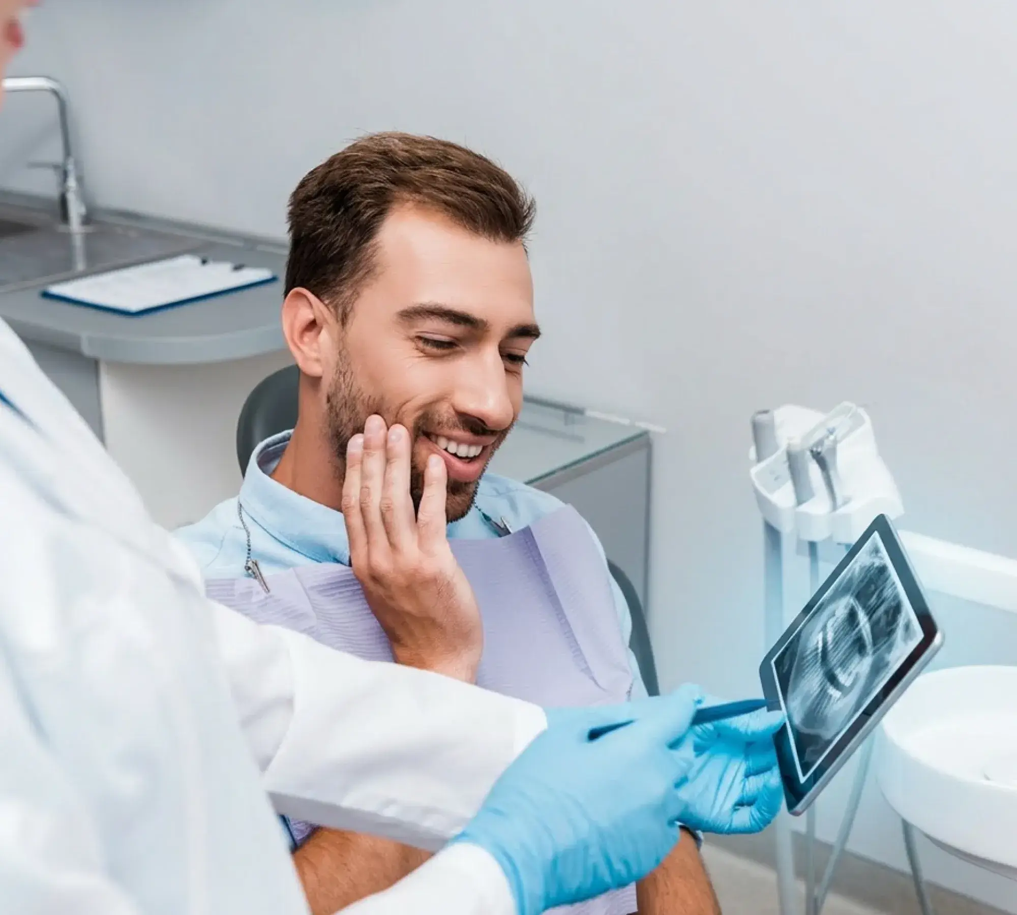 Patient sharing a confident smile after dental care