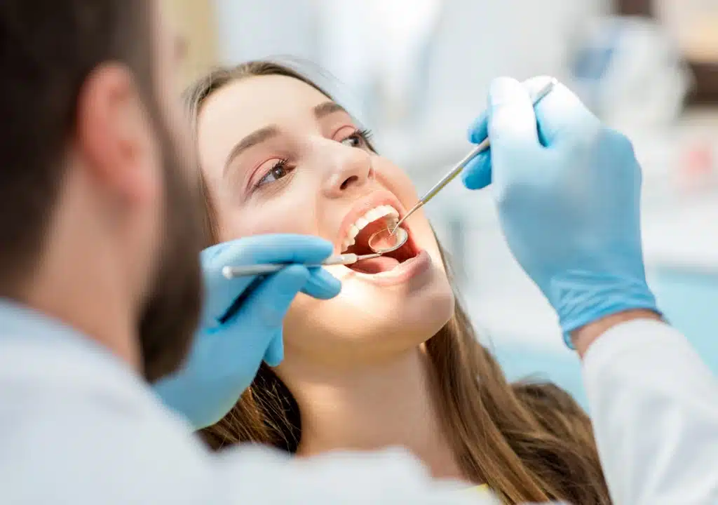 Dentist discussing a focused treatment plan with a patient